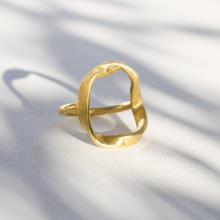 statement gold ripple ribbon ring