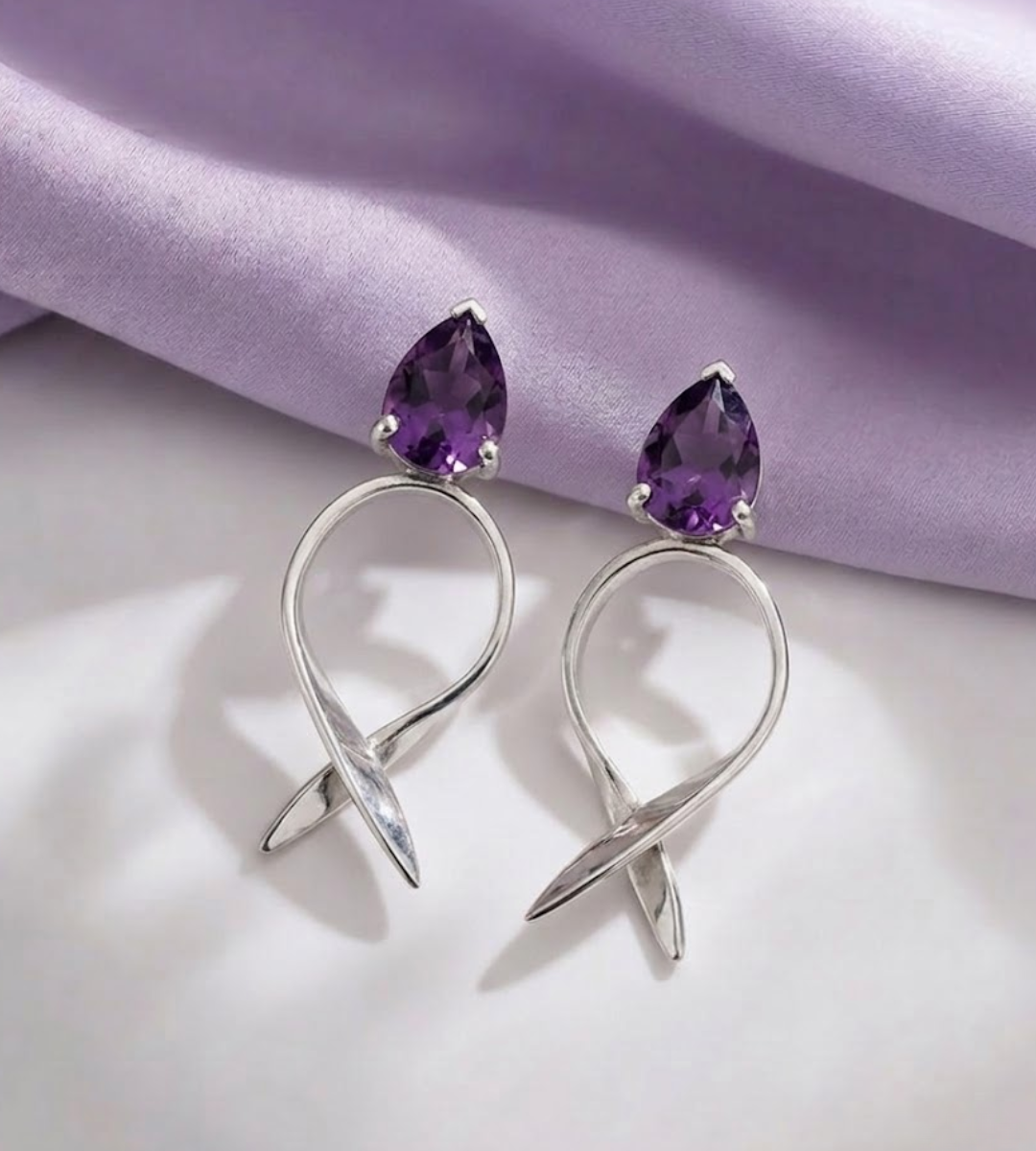 Edele statement twisted ribbon silver earrings with pear cut amethysts 2